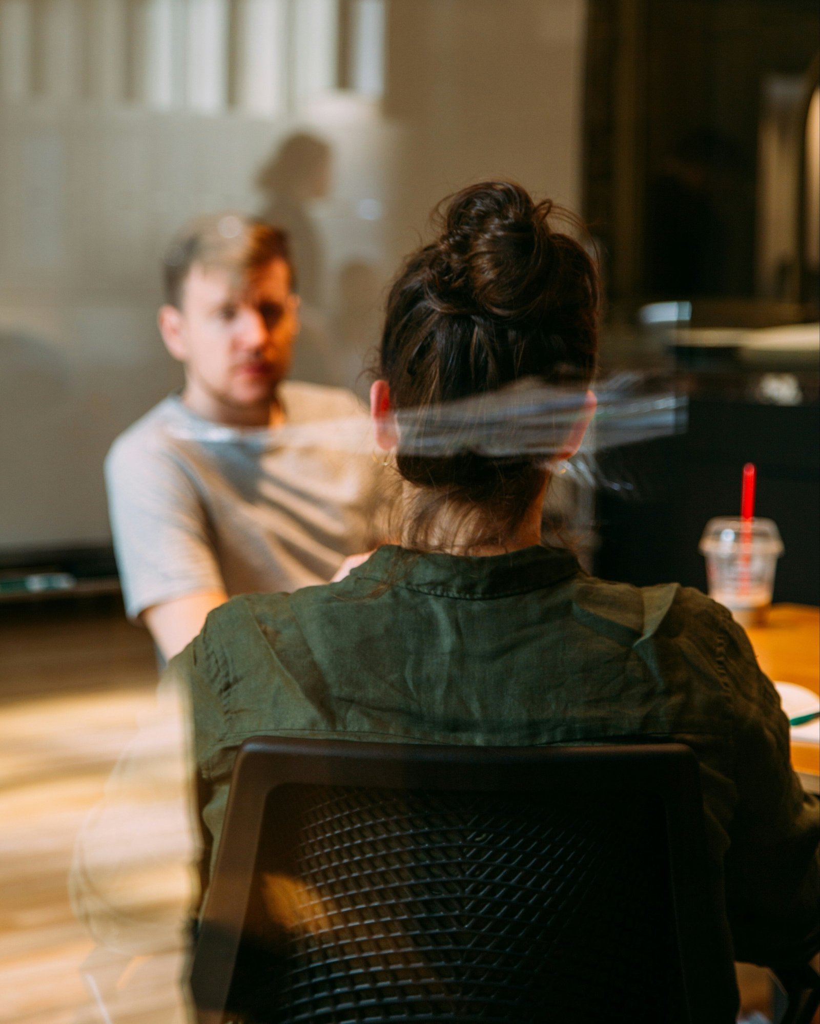 two people in a meeting 54